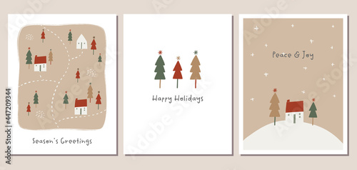 Set of winter holiday greeting cards with hand drawn trees and little houses in trendy natural colors.