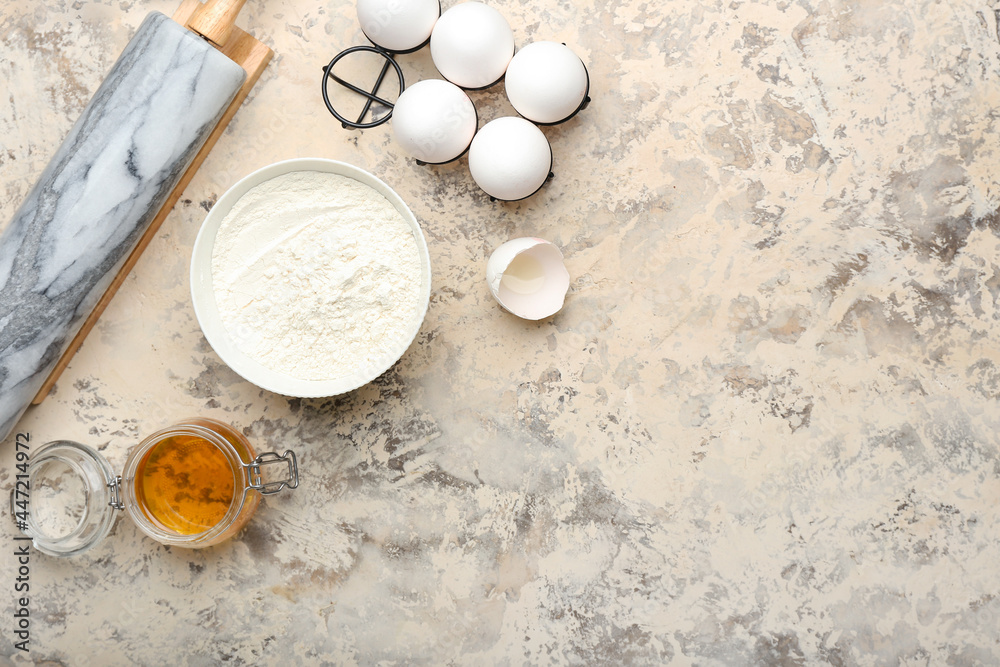 Ingredients for preparing bakery and utensils on grunge background Ingredients for preparing bakery and utensils on grunge background