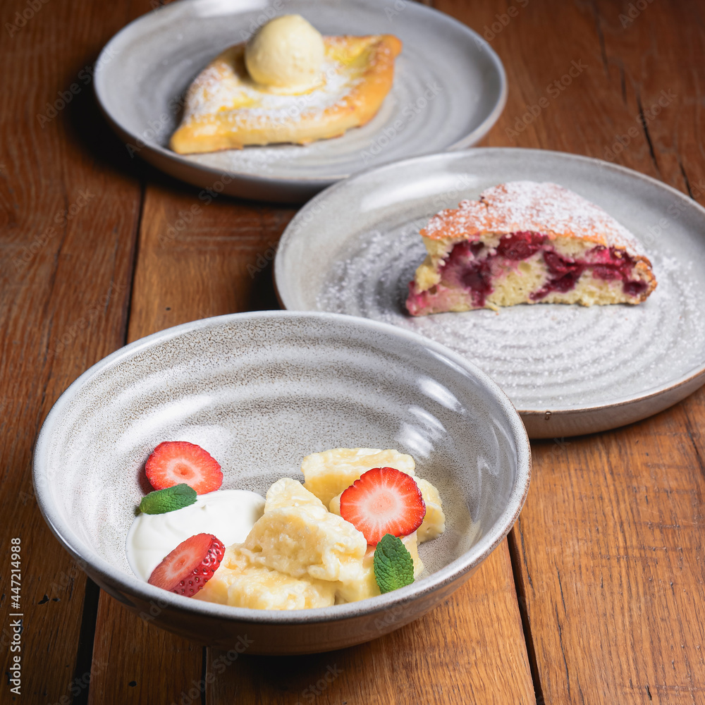 Gerogian desserts with ice cream and fresh organic strawberry. Georgian cuisine concept. Gerogian desserts with ice cream and fresh organic strawberry. Georgian cuisine concept.