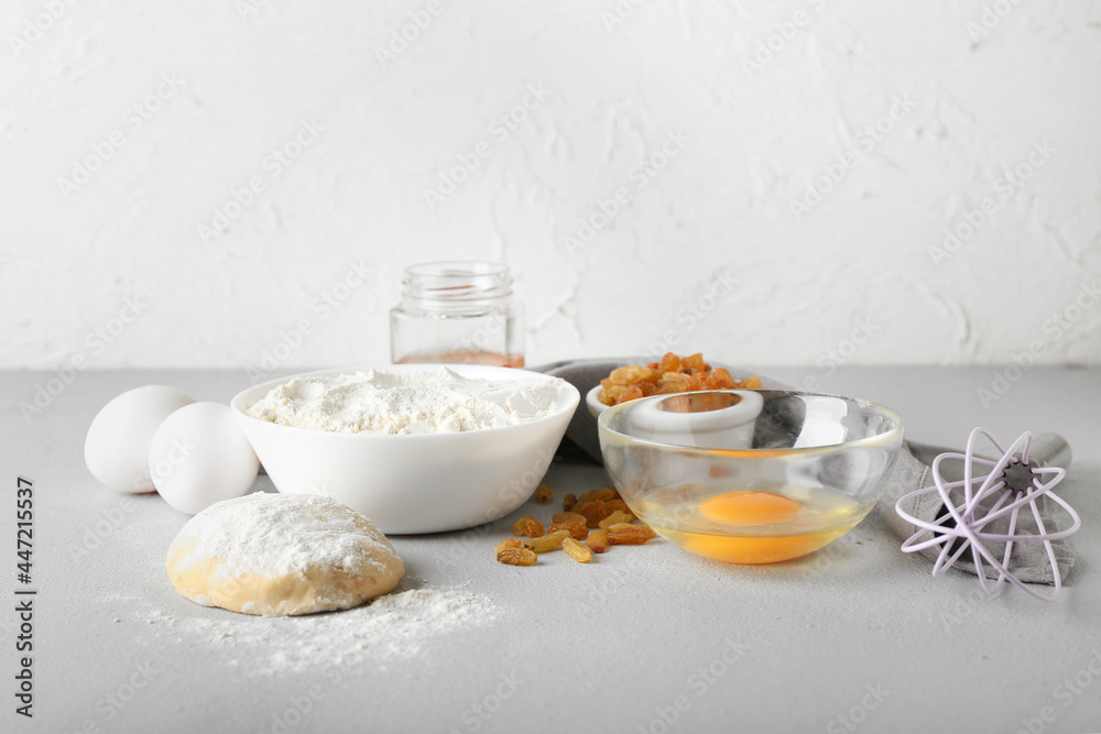 Ingredients for preparing bakery and utensils on light background Ingredients for preparing bakery and utensils on light background