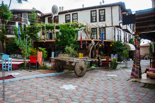 A wooden ox cart decoratively displayed on the streets of Ankara.