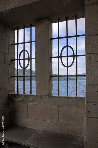 Window with iron bars. Historic dam. Green energy . Blue energy. Waldeck. Hemfurth Edersee. Waldeck-Frankenberg district Hesse  Germany. Lake.. Electricity generation.