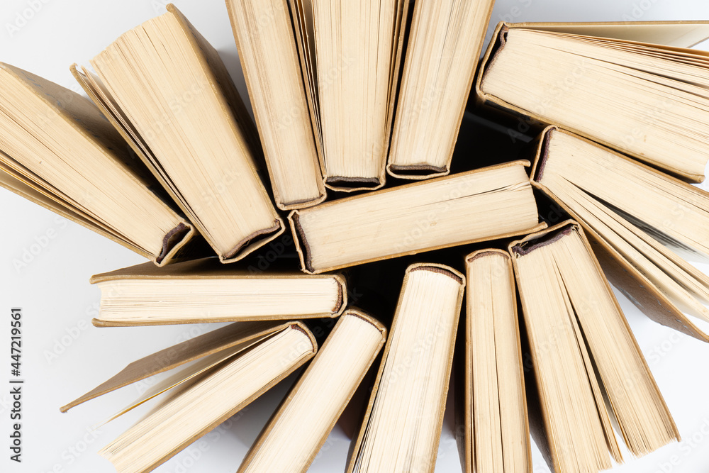Obraz premium Old hardback books background. Top view. education background. Back to school. Copy space for text.