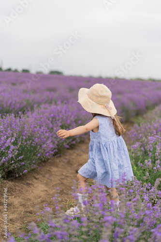 girl in a hat in a lavender field