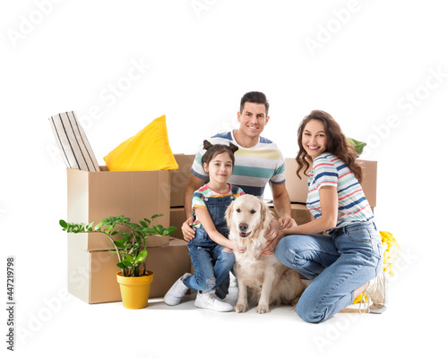 Happy family with dog and b...