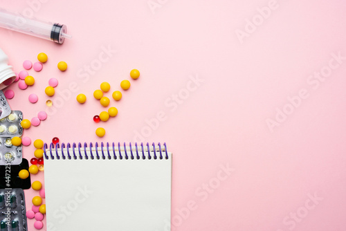 notebook medicine medicines pharmaceutical painkillers pink background