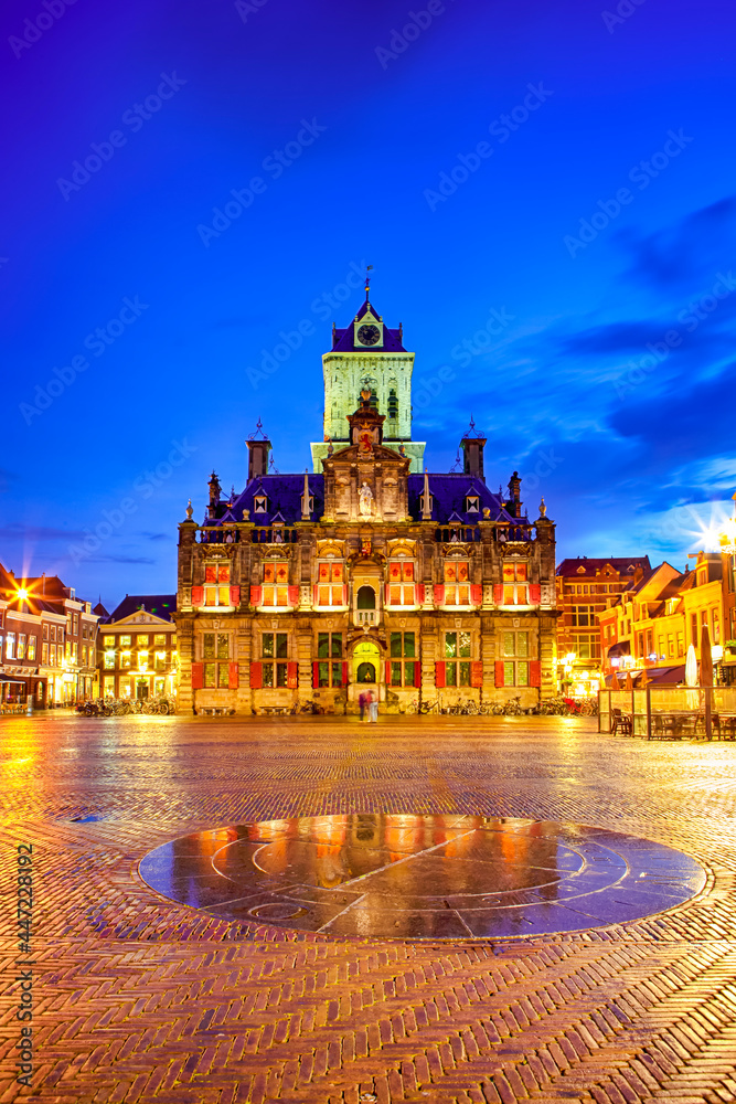 Dutch Travel Concepts. Unique Stadhuis (Known as City Hall) at Local Markt Square (Market Place)  in Dutch Old City Delft during Blue Hour, in Holland, the Netherlands.