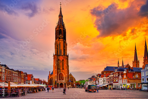 Dutch Travel Concepts. Protestant New Gothic Church (Nieuwe Kirche) on Markt Square in Dutch Old City Delft in Holland, the Netherlands. photo
