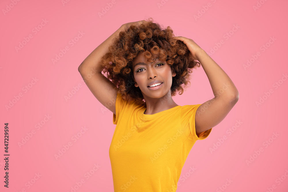 Beauty portrait of African American girl with afro hair. Real people lifestyle. Beauty portrait of African American girl with afro hair. Real people lifestyle.