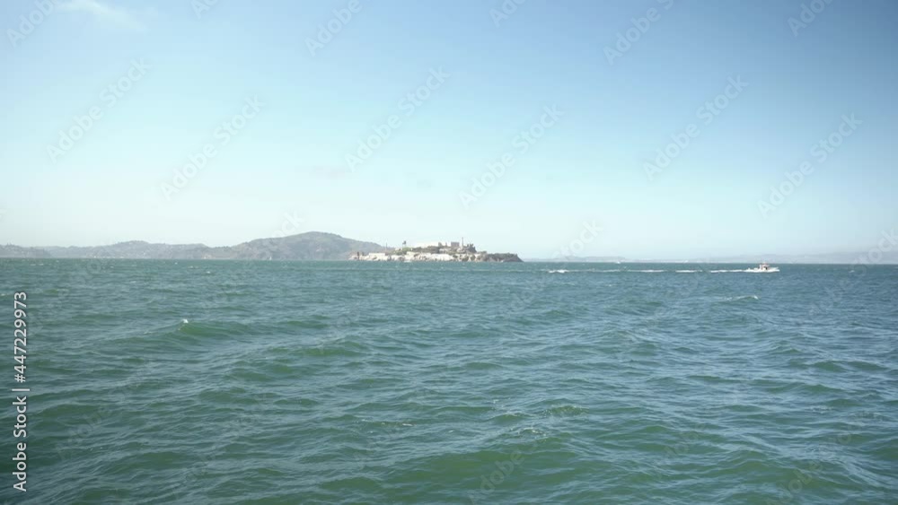 Ship sailing by the Alcatraz Island in San Francisco Ship sailing by the Alcatraz Island in San Francisco
