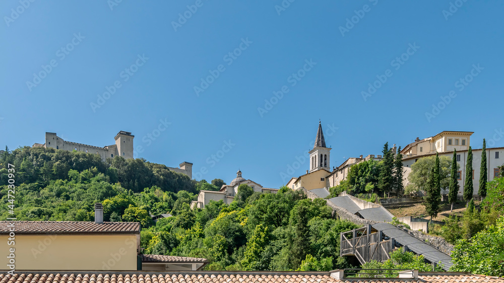 Panoramic view of the historic center of Spoleto, Italy, with the system of covered escalators to reach the Rocca