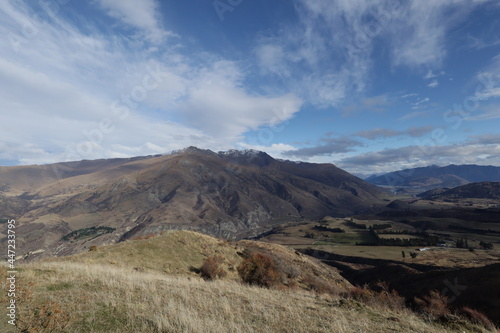 New Zealand Landscape with mountains, sky , water and trees