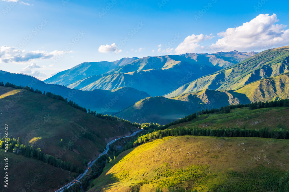 Aerial View of mountain and green forest with grass in Kanas Scenic Area,Xinjiang,China.