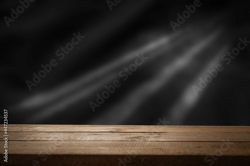 dark background with brown empty table