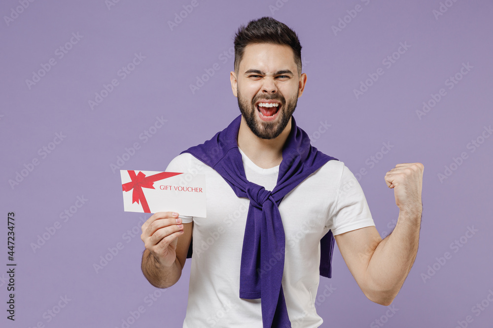 Φωτογραφία Satisfied cheerful young brunet man 20s wears white t-shirt purple shirt hold gi
