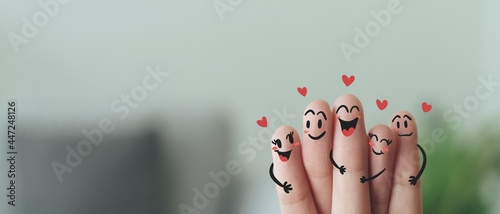 Closeup of Fingers With Happy Smiling Face, Friendship, Family, Group, Teamwork, Community, Unity, Love Concept. photo