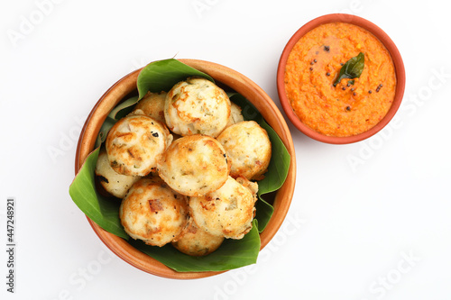 Kuzhi Paniyaram served with tomato chutney - South Indian breakfast