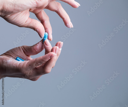 Woman hand holding pills. Pills. Background. Medicine. Background. Hand. 