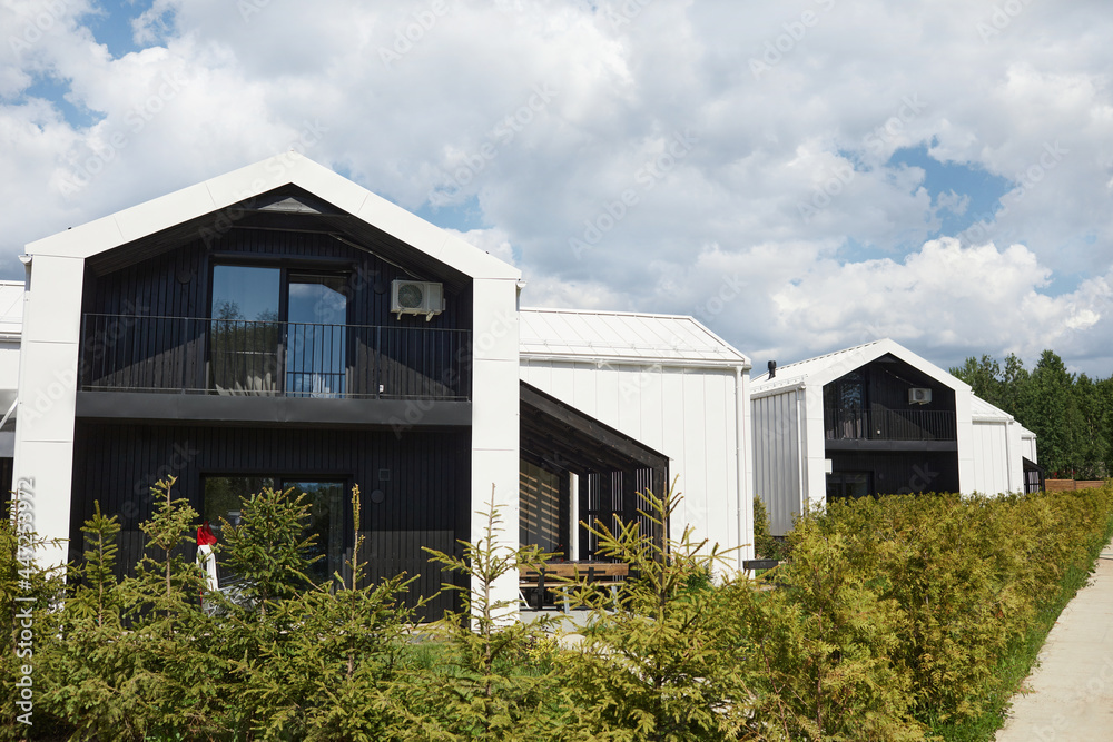 Background image of houses designed with minimal Scandinavian aesthetic in black and white colors, copy space Background image of houses designed with minimal Scandinavian aesthetic in black and white colors, copy space