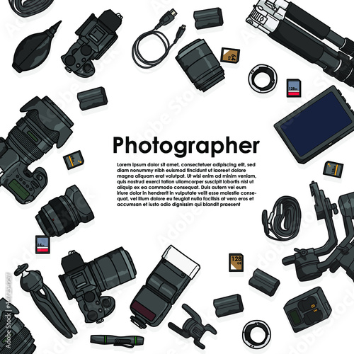 top view of work space photographer with digital camera and camera accessory.
