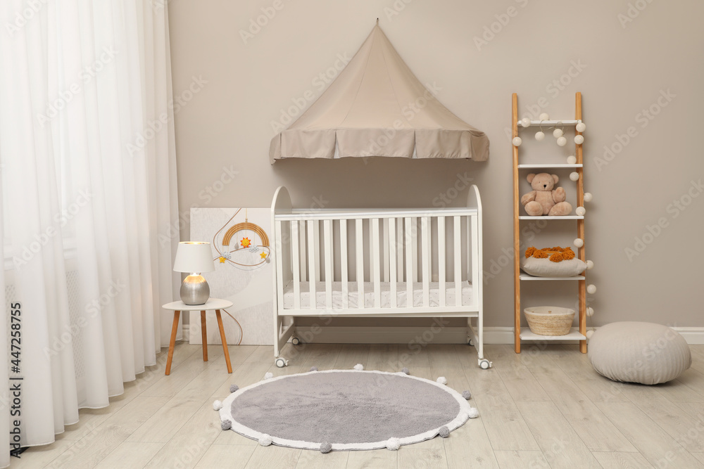 Modern baby room interior with stylish crib Modern baby room interior with stylish crib