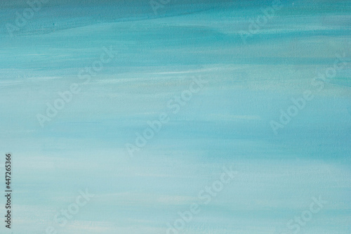 Painted blue sky as background on the canvas