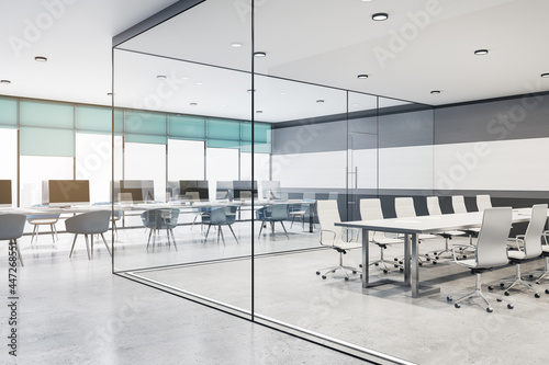 Modern concrete and glass meeting room office interior with furniture  equipment and daylight. 3D Rendering.