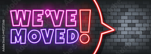 We have moved neon text on the stone background. We have moved. For business, marketing and advertising. Vector on isolated background. EPS 10
