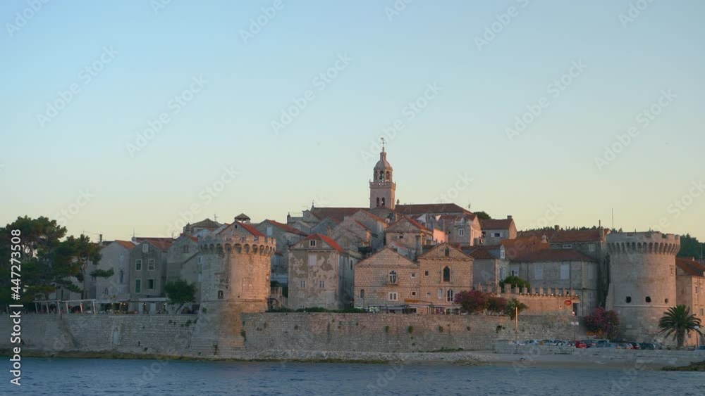 Picturesque view of the stunning medieval fort of Korcula island at sunrise. Spectacular vista of a historic fortress on the coast of a quiet island in the Mediterranean. Coastal stronghold at sunset. Picturesque view of the stunning medieval fort of Korcula island at sunrise. Spectacular vista of a historic fortress on the coast of a quiet island in the Mediterranean. Coastal stronghold at sunset.