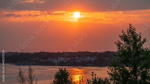 Romantic sunset above the Markkleeberger Lake near Leipzig photo