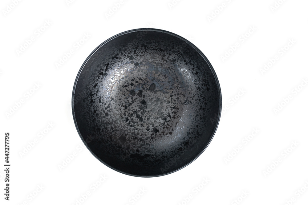 Empty isolated black plate on white bakground. Empty isolated black plate on white bakground.