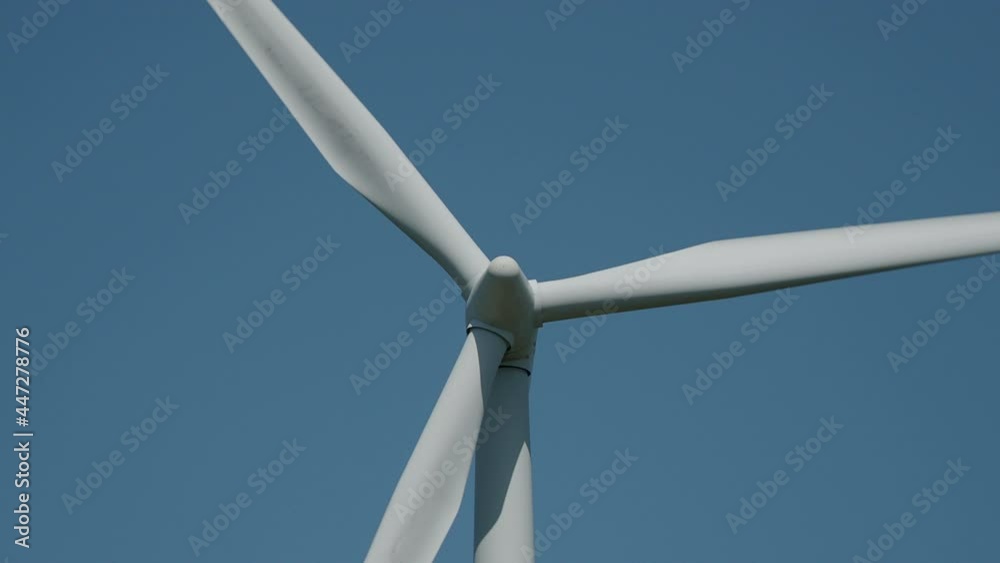 Wind Turbine against blue sky Wind Turbine against blue sky