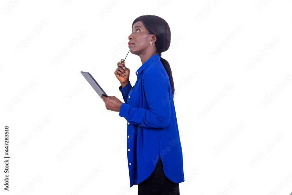 close-up of a beautiful businesswoman using tablet, pensive. close-up of a beautiful businesswoman using tablet, pensive.