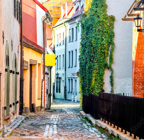 In old Riga city tourists can find unique atmosphere of Middle Ages and famous ensembles of Gothic architecture photo