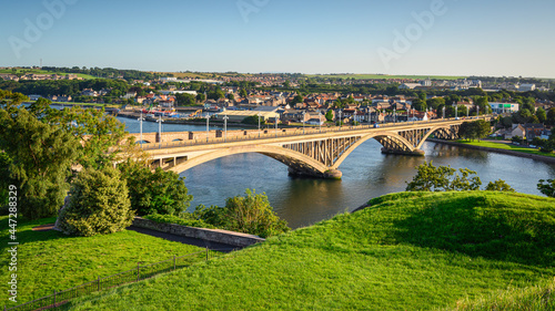 Elevated view of Royal Tweed Bridge in Berwick. Berwick upon Tweed is the most northerly town in England and is located in Northumberland at the mouth of the River Tweed just below the Scottish border photo