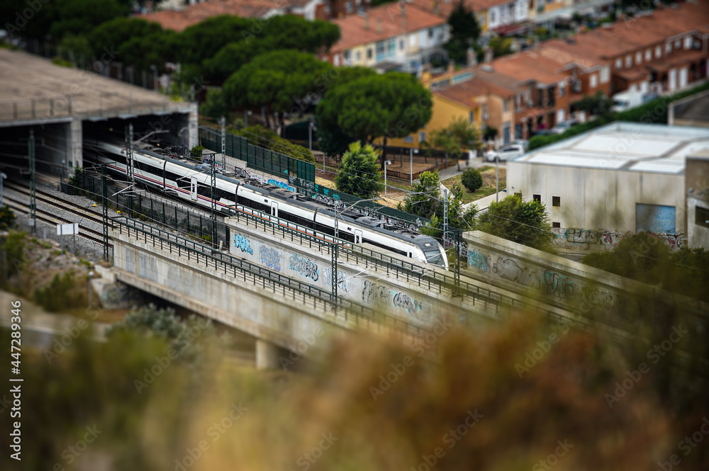 a train getting out of a tunnel with Tilt-Shift effect