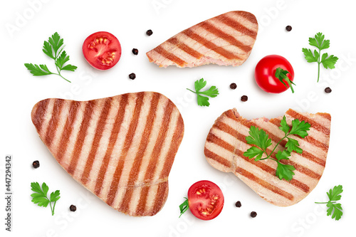 Tuna fish steak grilled isolated on white background with clipping path and full depth of field, Top view. Flat lay