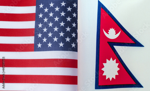 fragments of the national flags of the United States and Nepal in close-up