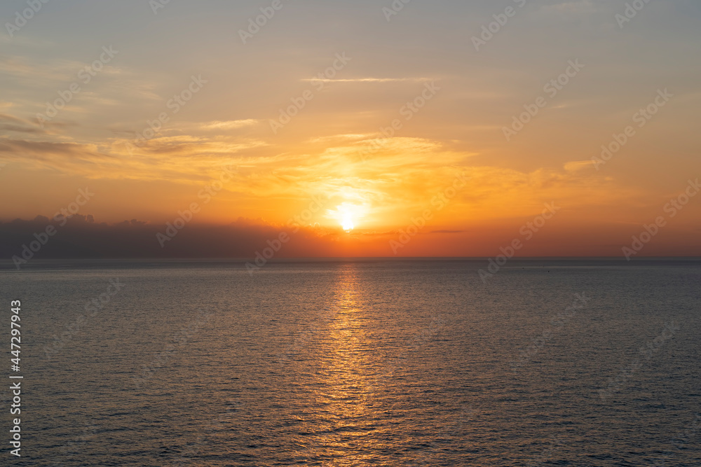 seascape with a beautiful sunset on the background of the sea