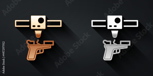 Gold and silver 3D printer gun icon isolated on black background. 3d printing. Long shadow style. Vector
