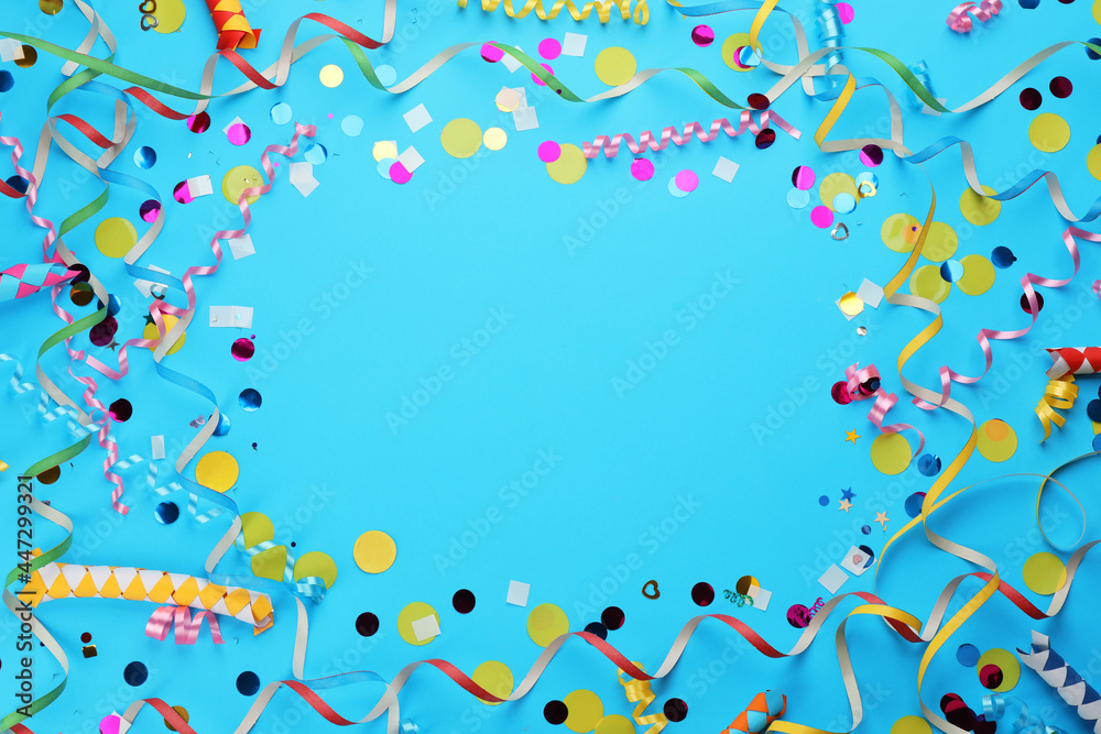 Frame made with carnival items on light blue background, flat lay. Space for text - obrazy, fototapety, plakaty 