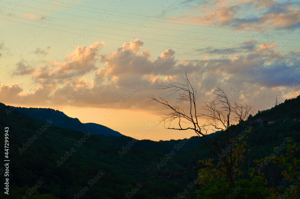 Sunset behind hills in Rijeka, Croatia. Magical sunset with hill as silhouette