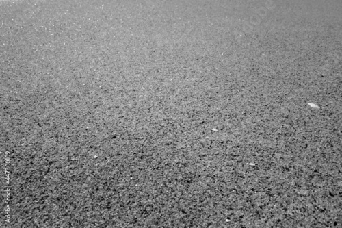 Beach sea sand close-up in black and white.