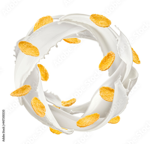 Milk splash with corn flakes isolated on white background photo