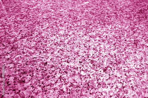 Fototapeta Naklejka Na Ścianę i Meble -  Granite surface as background with blur effect in pink tone.