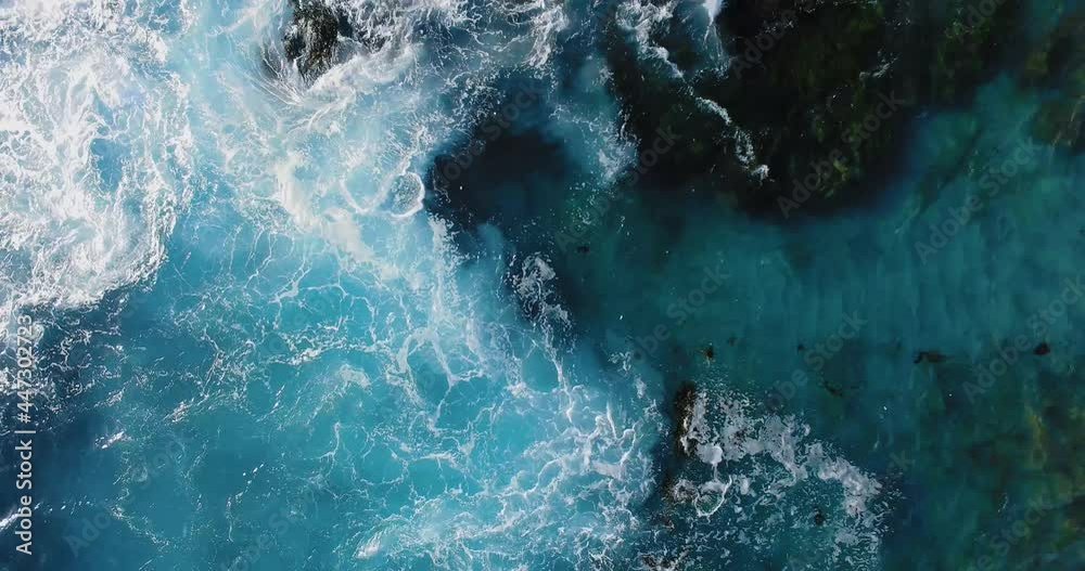 Drone captures white waves from a bird's eye view, aerial shot of pacific coast at Laguna Beach, California, USA Drone captures white waves from a bird's eye view, aerial shot of pacific coast at Laguna Beach, California, USA