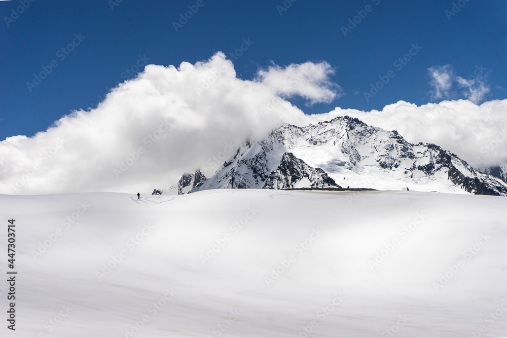 Great nature mountain landscapes. High mountains under snow. Scenic View Of Mountains Against Blue Sky.