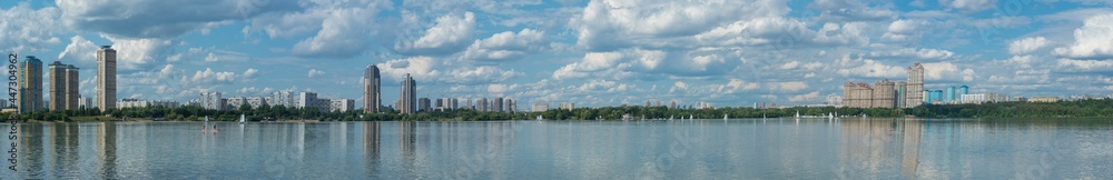 Wide panoramic view of the Stroginsky Bay of Moskva River and urban cityscape of the Shchukino and Strogino districts, Moscow photo