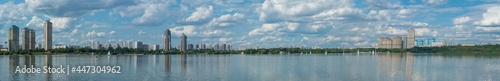 Wide panoramic view of the Stroginsky Bay of Moskva River and urban cityscape of the Shchukino and Strogino districts, Moscow photo