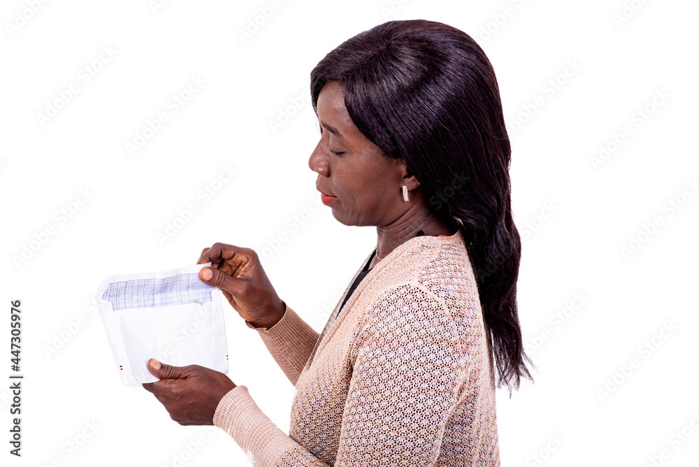 portrait of a beautiful woman holding an envelope. portrait of a beautiful woman holding an envelope.